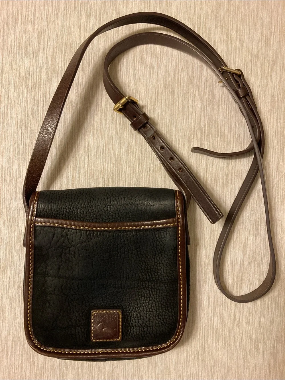 Dooney Bourke strap leather staining